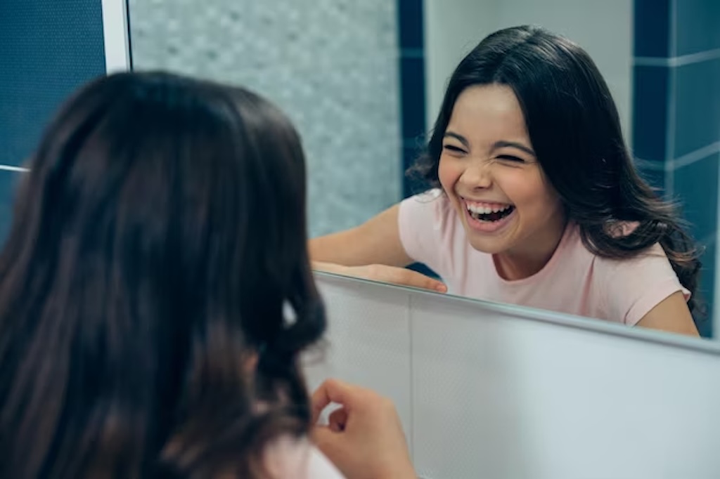 Laughing in the mirror